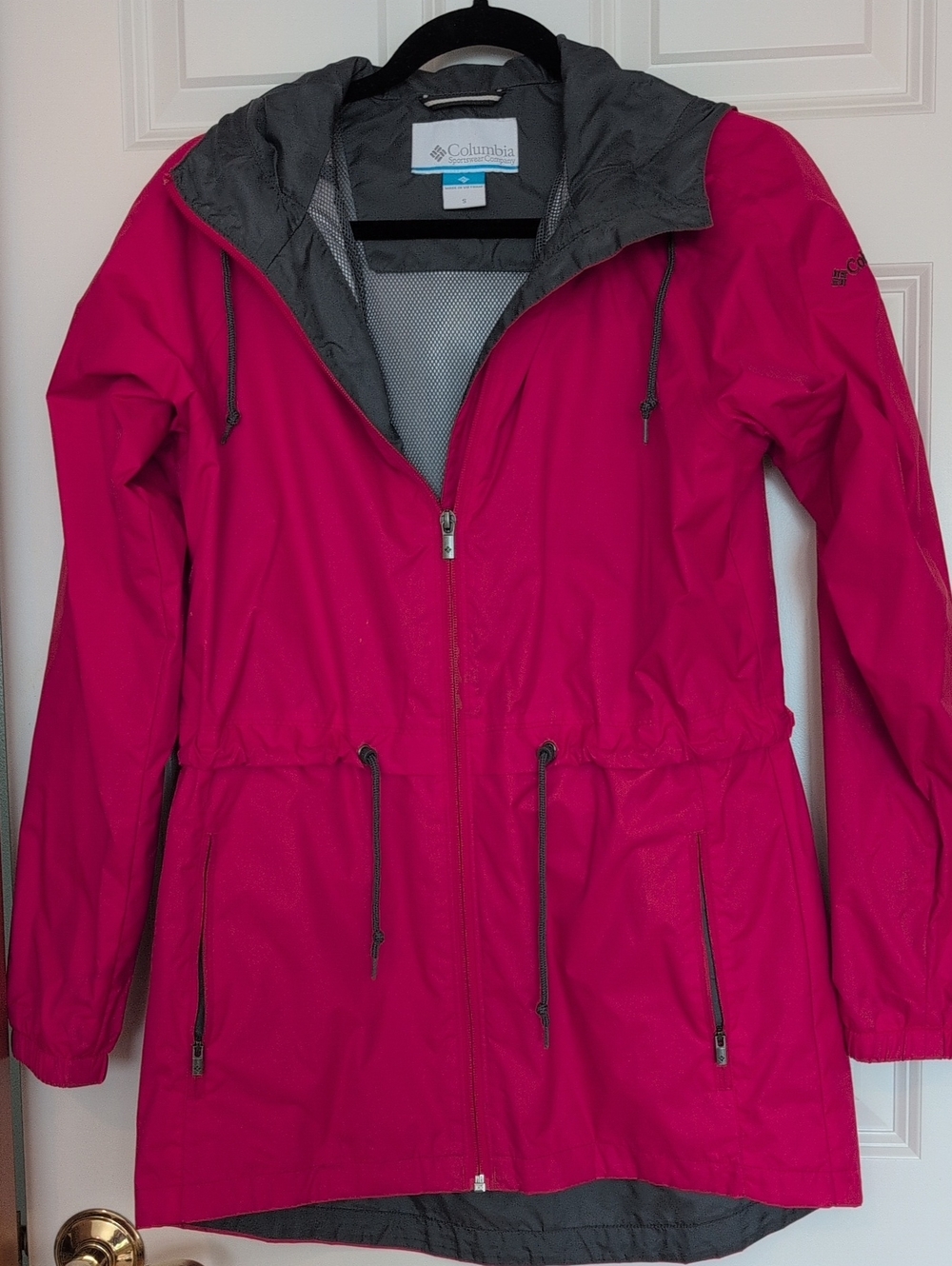 Columbia Magenta Hooded Rain Coat with Gray Trim.  Lillian I?